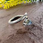 Serpent’s Glow Moonstone Wrap Ring