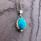Artisan Turquoise Oval Pendant in Swirl Silver Setting