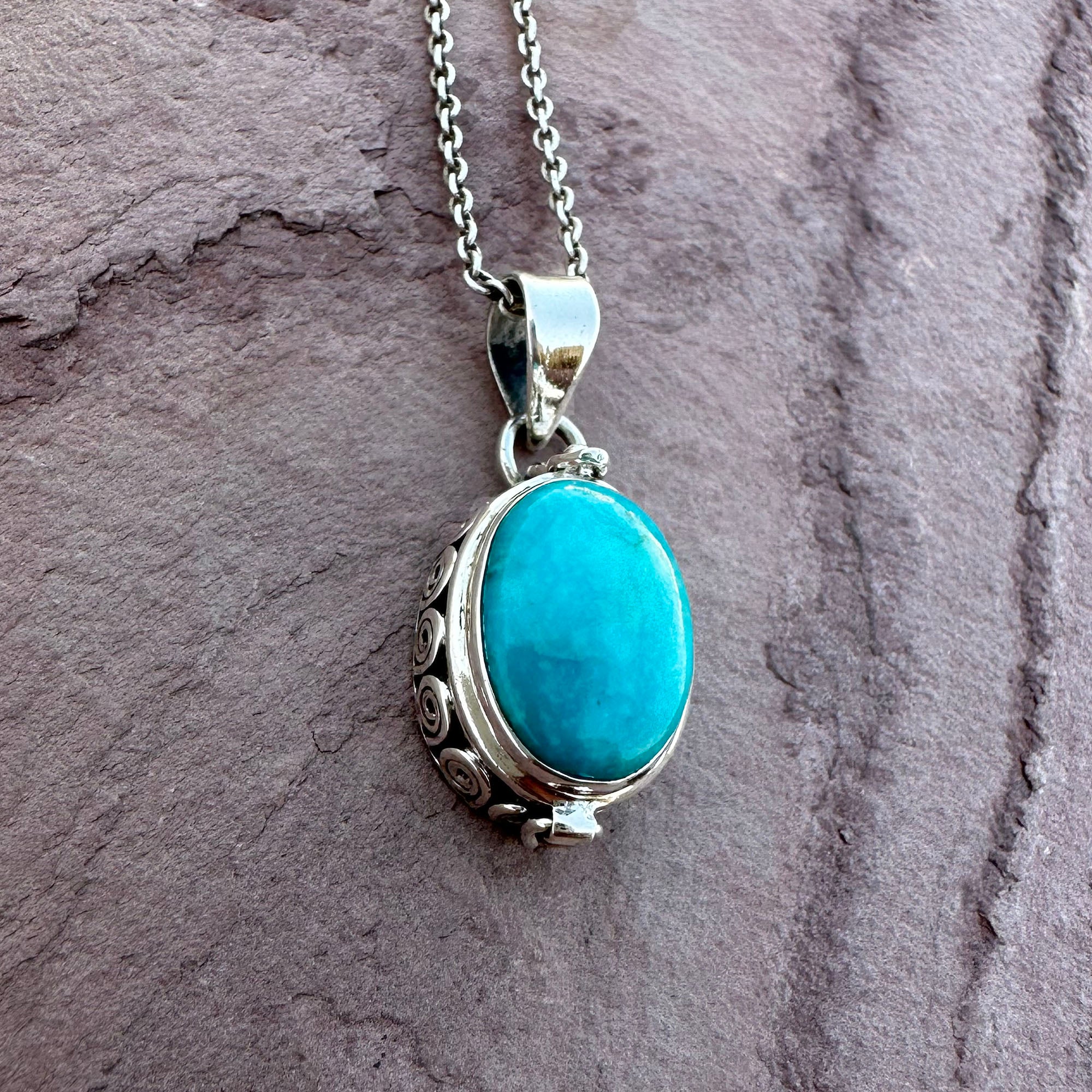 Artisan Turquoise Oval Pendant in Swirl Silver Setting