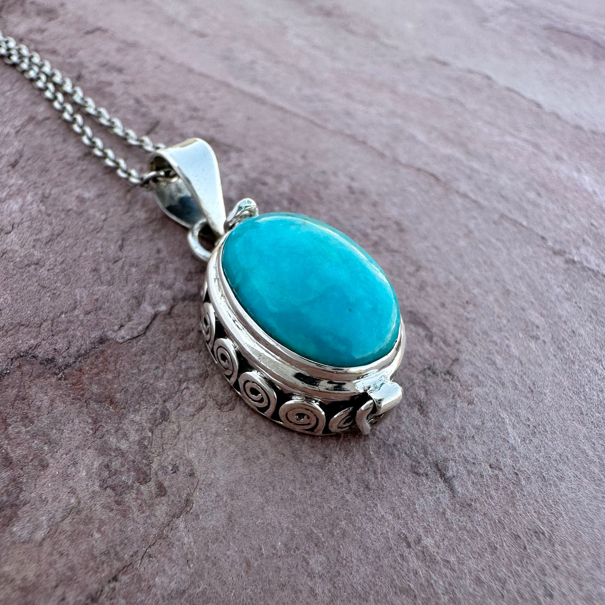 Artisan Turquoise Oval Pendant in Swirl Silver Setting