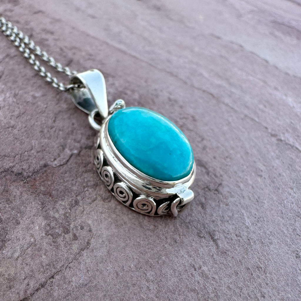 Artisan Turquoise Oval Pendant in Swirl Silver Setting