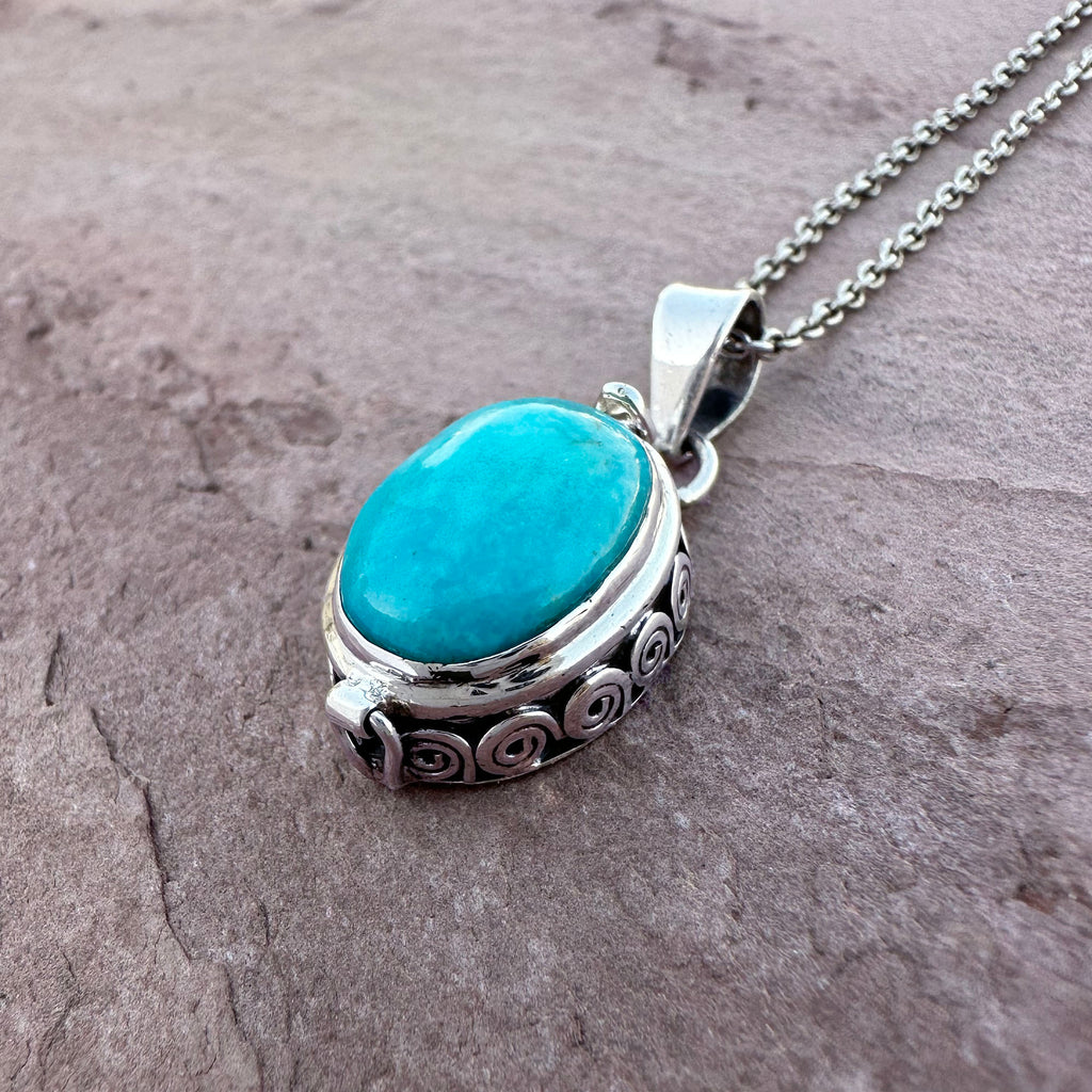 Artisan Turquoise Oval Pendant in Swirl Silver Setting
