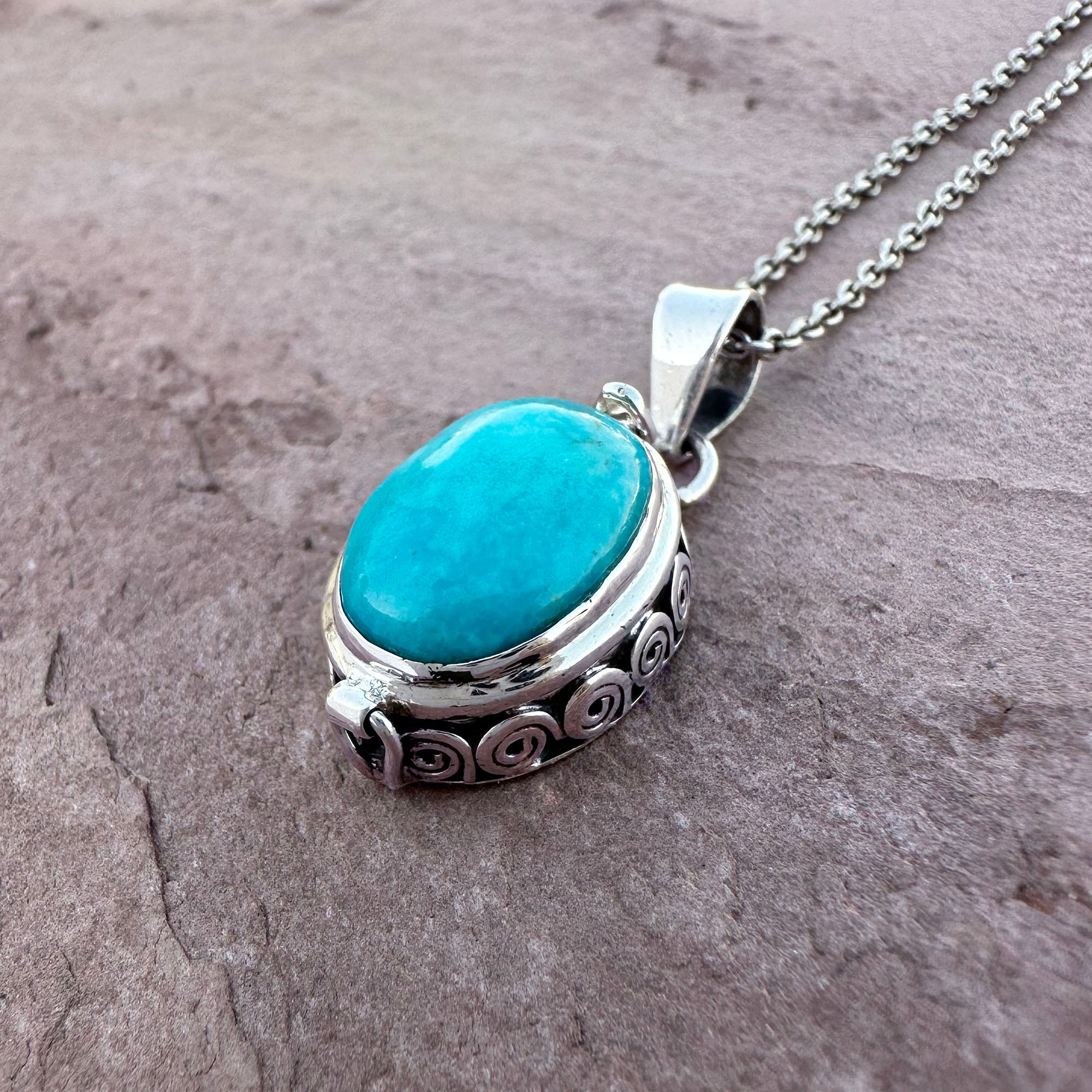 Artisan Turquoise Oval Pendant in Swirl Silver Setting