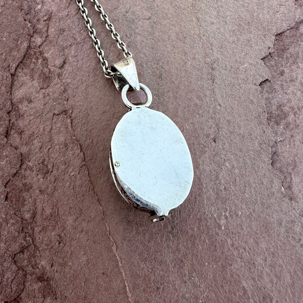 Artisan Turquoise Oval Pendant in Swirl Silver Setting