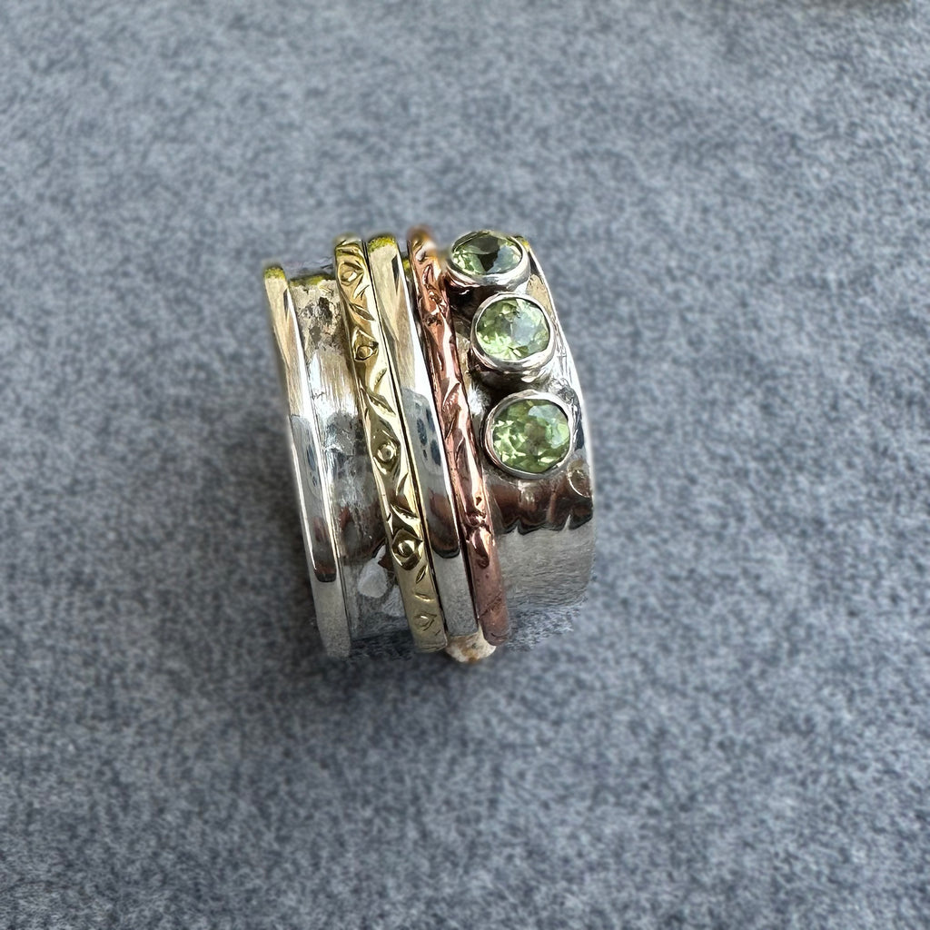 Mixed Metal Spinner Ring with Peridot – Three Peridot Stone Meditation Ring – Sterling Silver, Copper, and Brass Boho Ring