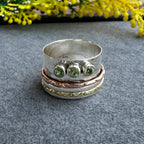 Mixed Metal Spinner Ring with Peridot – Three Peridot Stone Meditation Ring – Sterling Silver, Copper, and Brass Boho Ring
