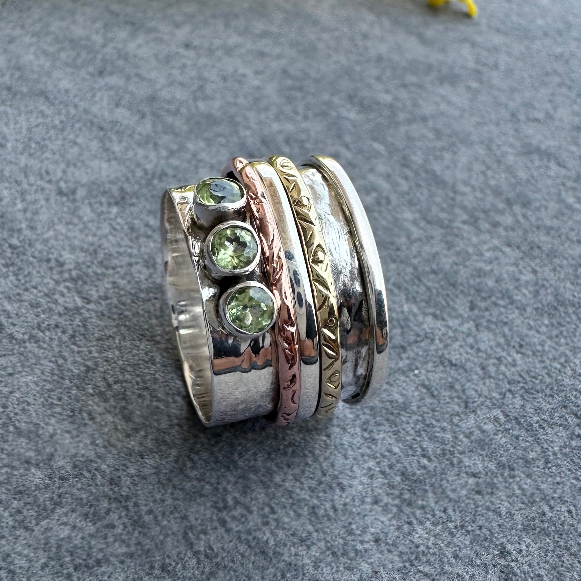 Mixed Metal Spinner Ring with Peridot – Three Peridot Stone Meditation Ring – Sterling Silver, Copper, and Brass Boho Ring